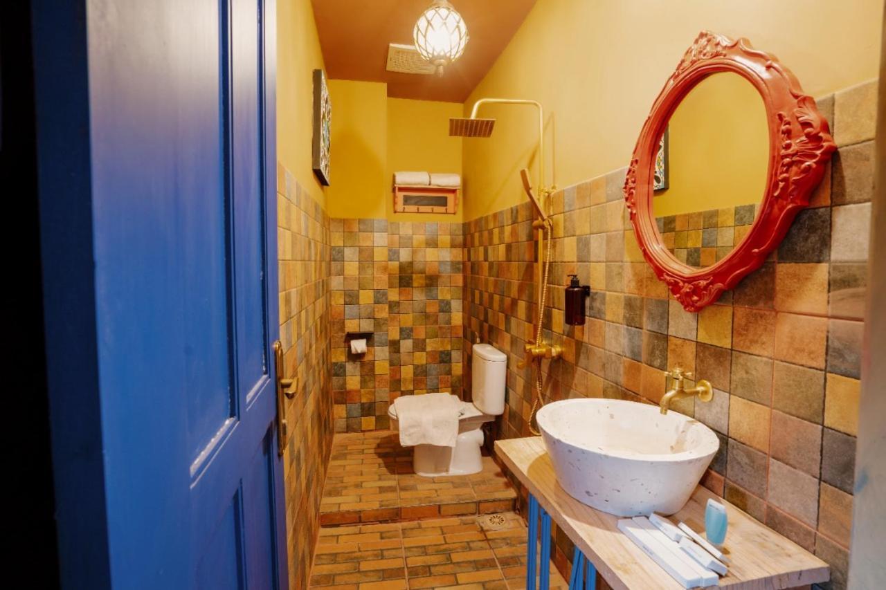 Por Aqui Stay & Dine Yogyakarta Esterno foto